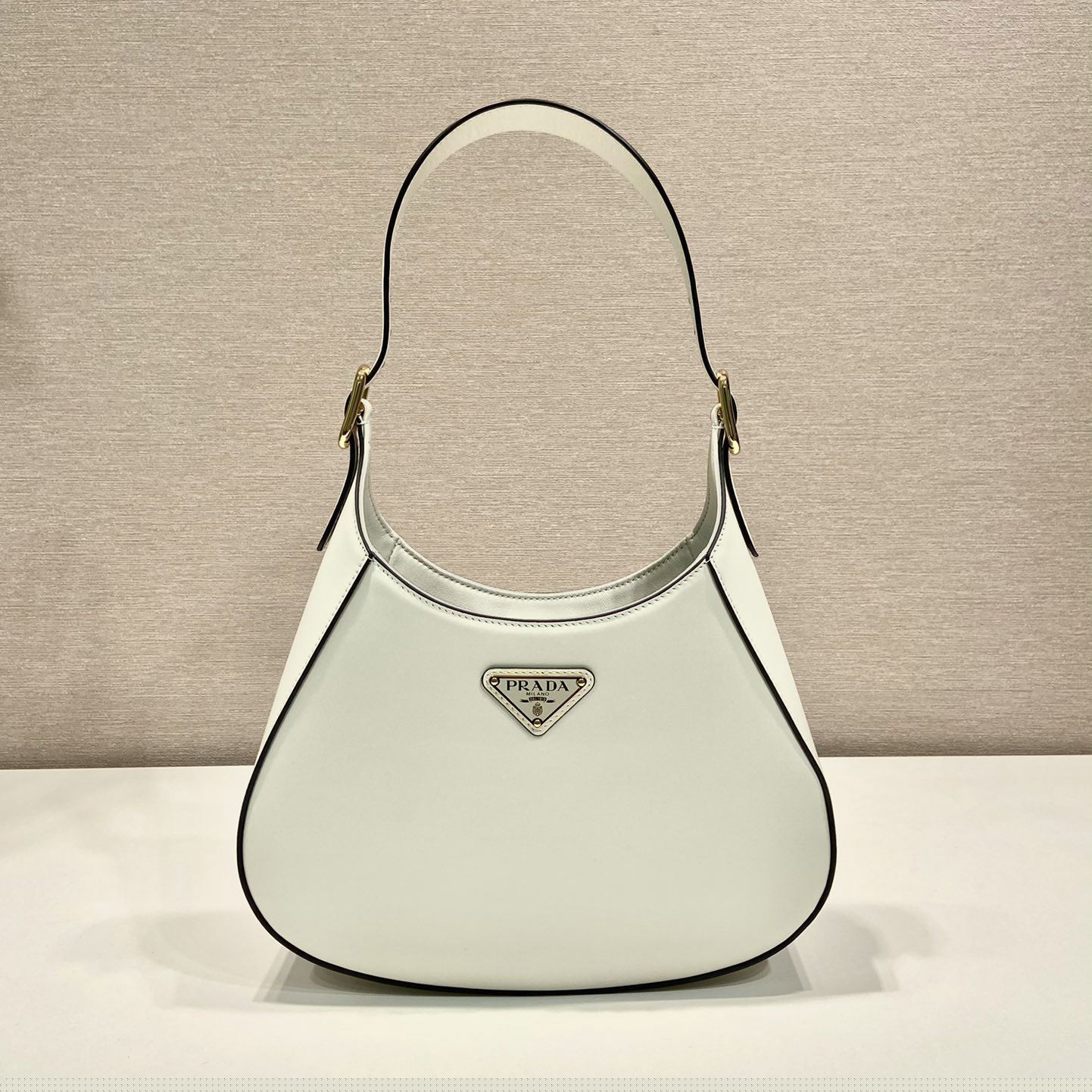 Pra*a top handle bags